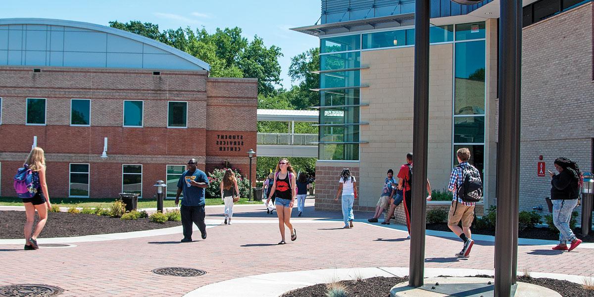 Students walk between buildings on the Arnold campus.
